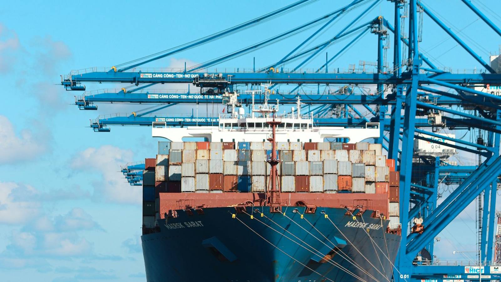 A container ship berthed at a port